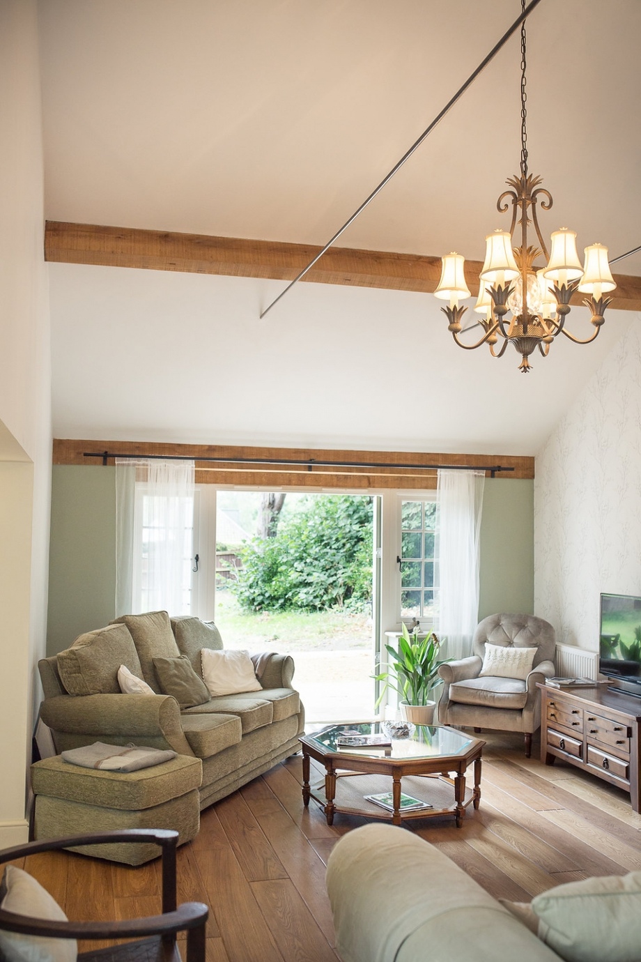 Garden Room with Exposed Beams and French Windows