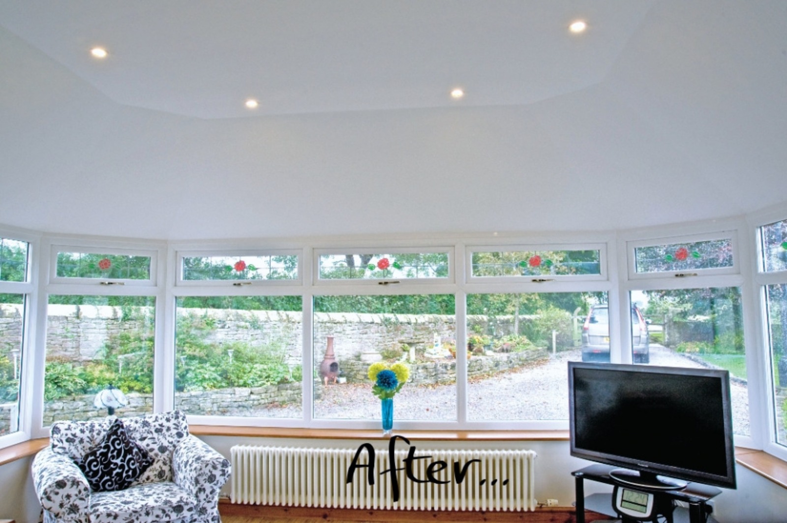 AFTER: And under that cosy roof is a plastered ceiling complete with spots