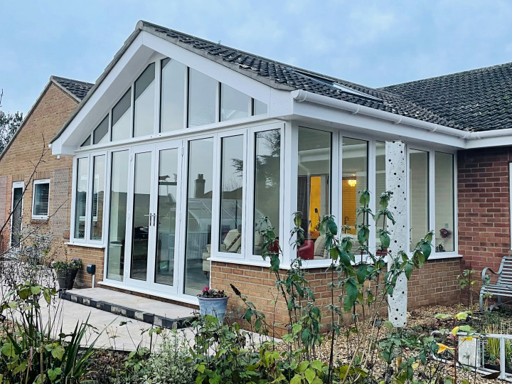 Aluminum Garden Room with valley detail into the existing roof