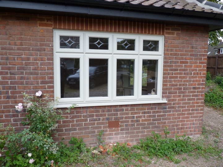 Norwich - Traditional-style UPVC window to complements this property