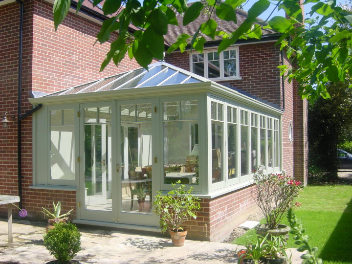 Edwardian conservatory with box-gutter detail and French doors