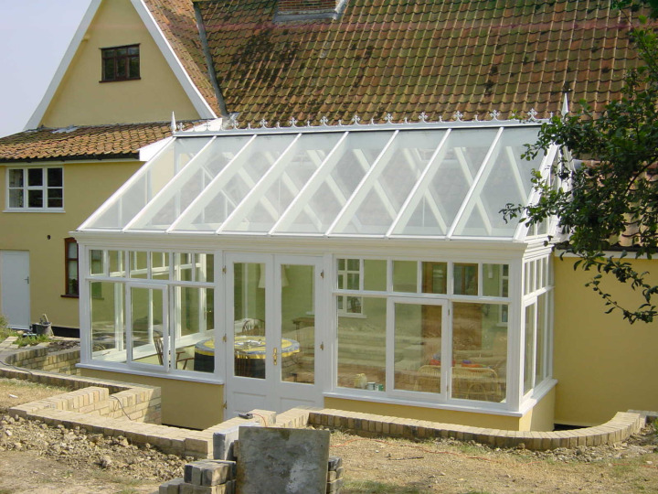 Gable conservatory with box-gutter detail