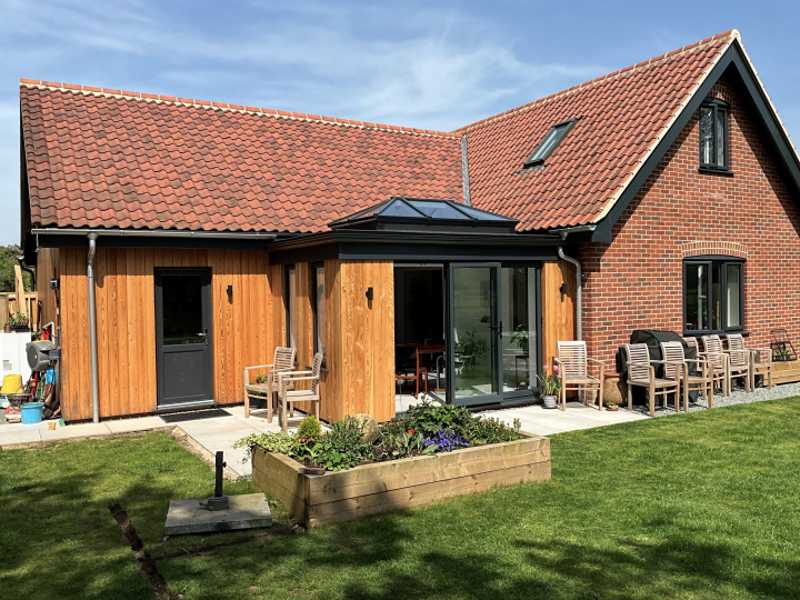 Larch-clad contemporary orangery
