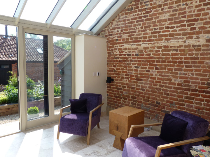 Lean-to Conservatory with double storey roof for a listed barn, Norfolk