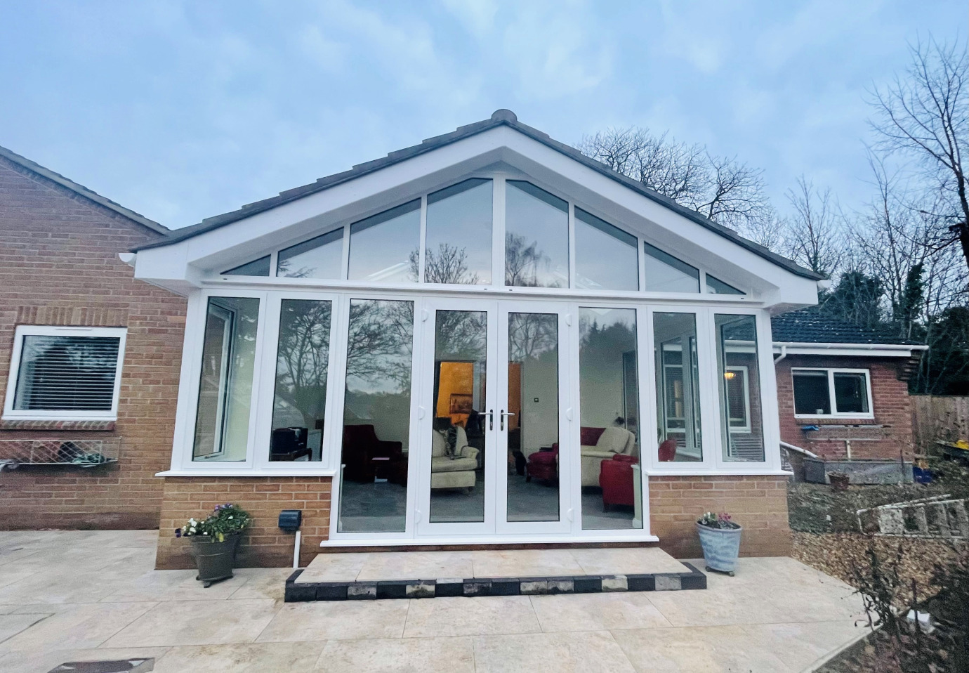 Aluminum Garden Room with valley detail into the existing roof