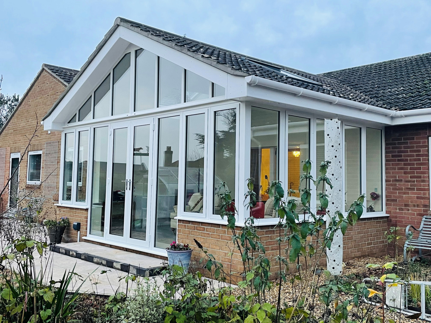 Aluminum Garden Room with valley detail into the existing roof