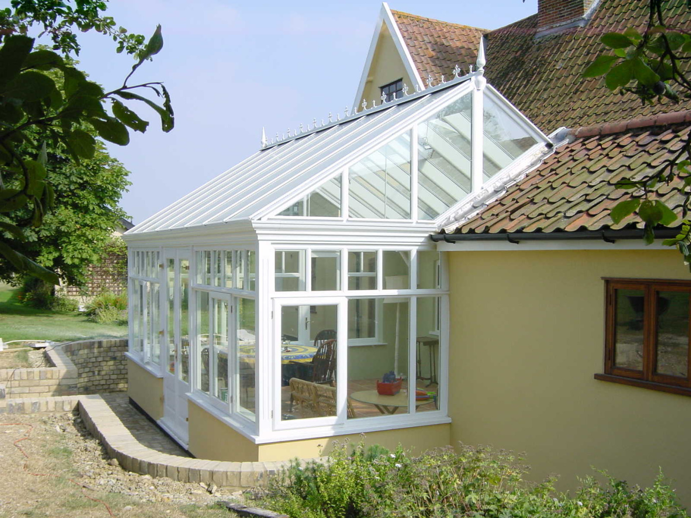 Gable conservatory with box-gutter detail