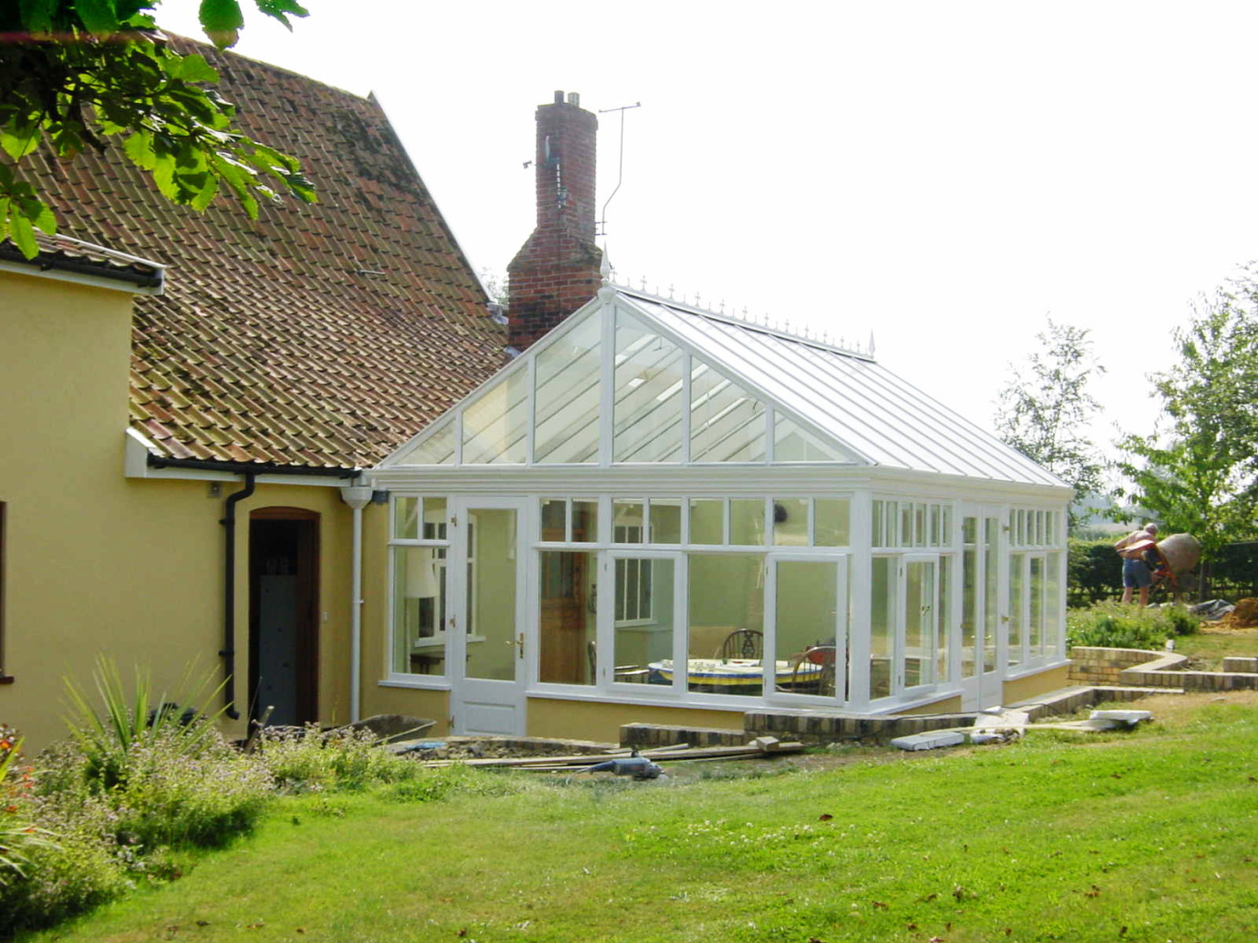 Gable conservatory with box-gutter detail