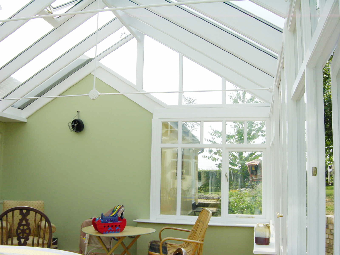 Gable conservatory with box-gutter detail