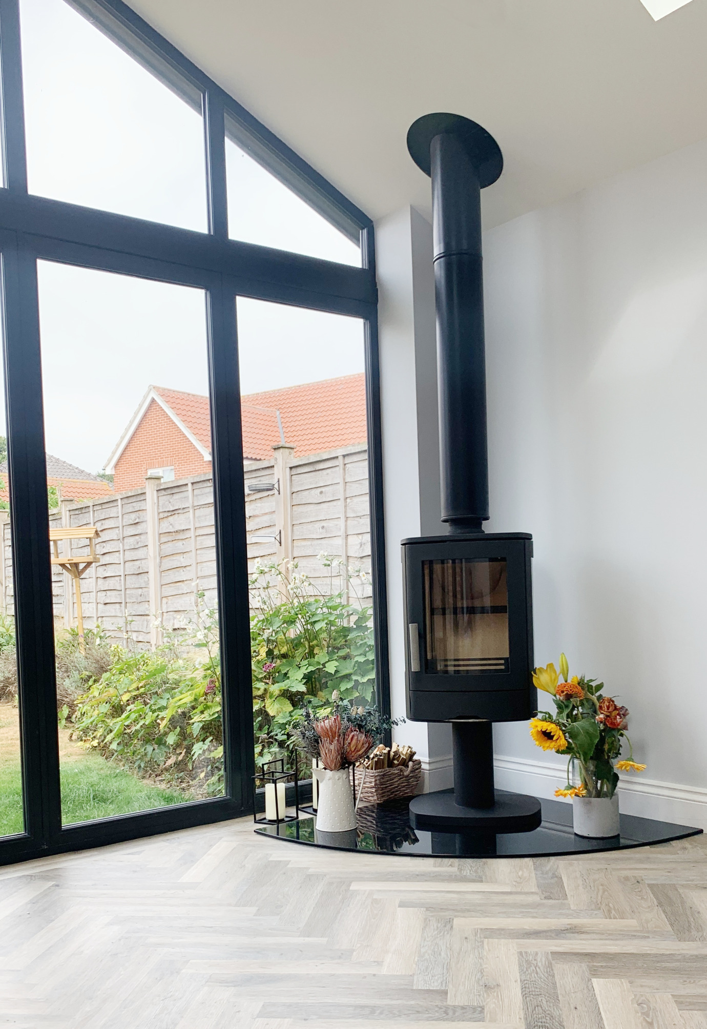 Glazed extension with modern wood burner