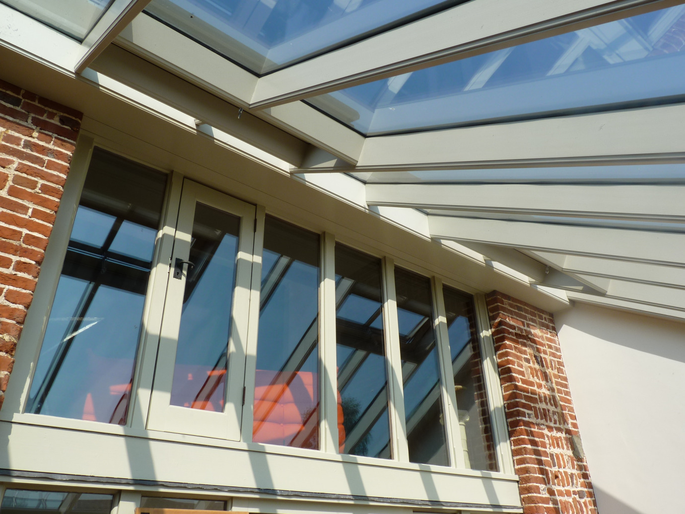 Lean-to Conservatory with double storey roof for a listed barn, Norfolk