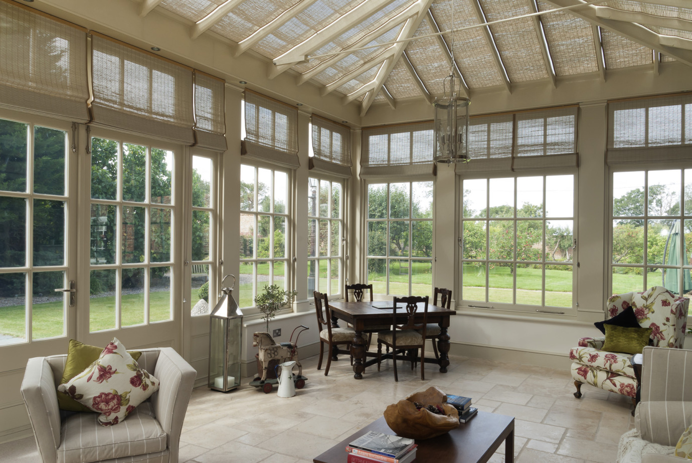 Traditional orangery with Georgian pilasters, French doors & clerestory windows