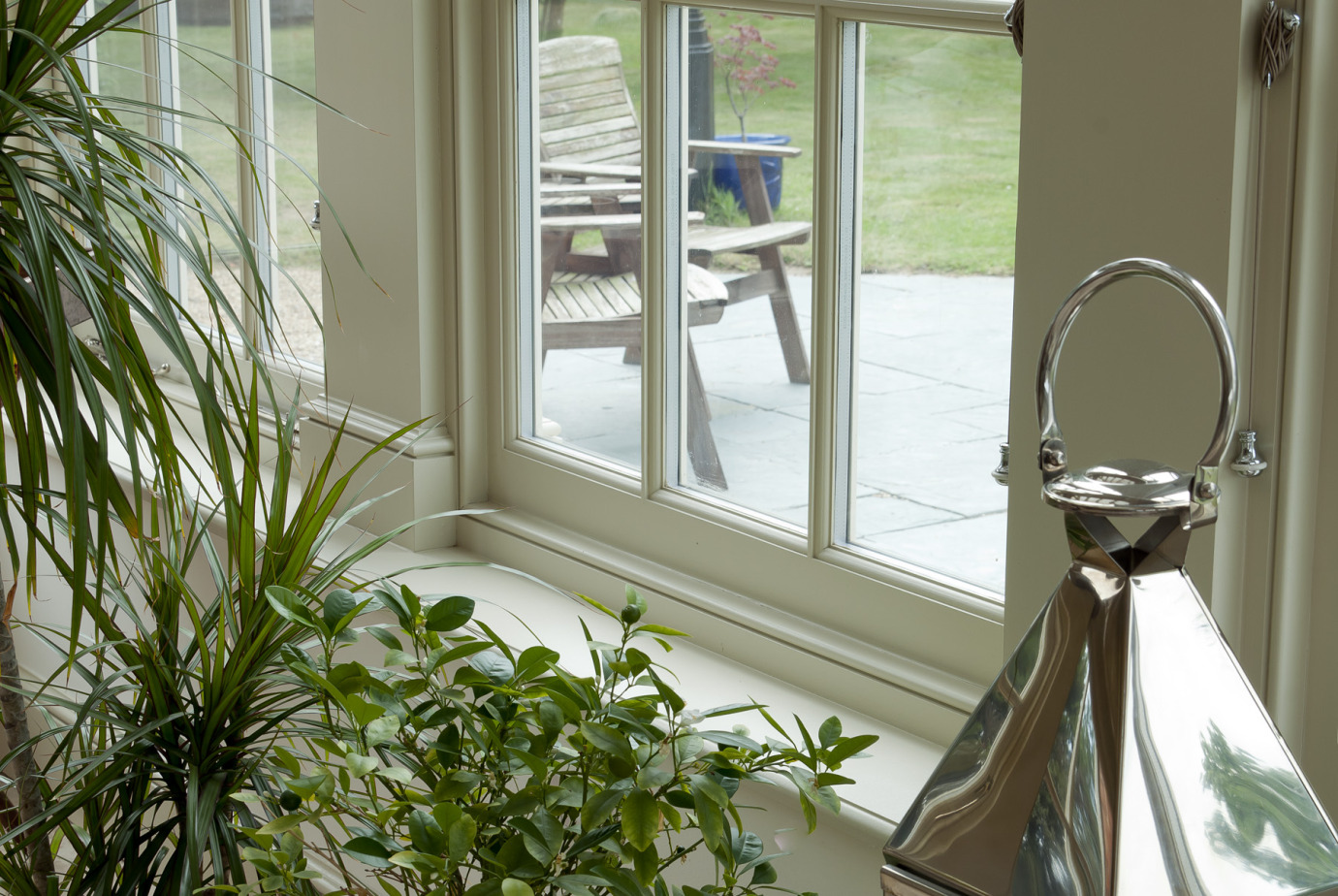 Traditional orangery with Georgian pilasters, French doors & clerestory windows