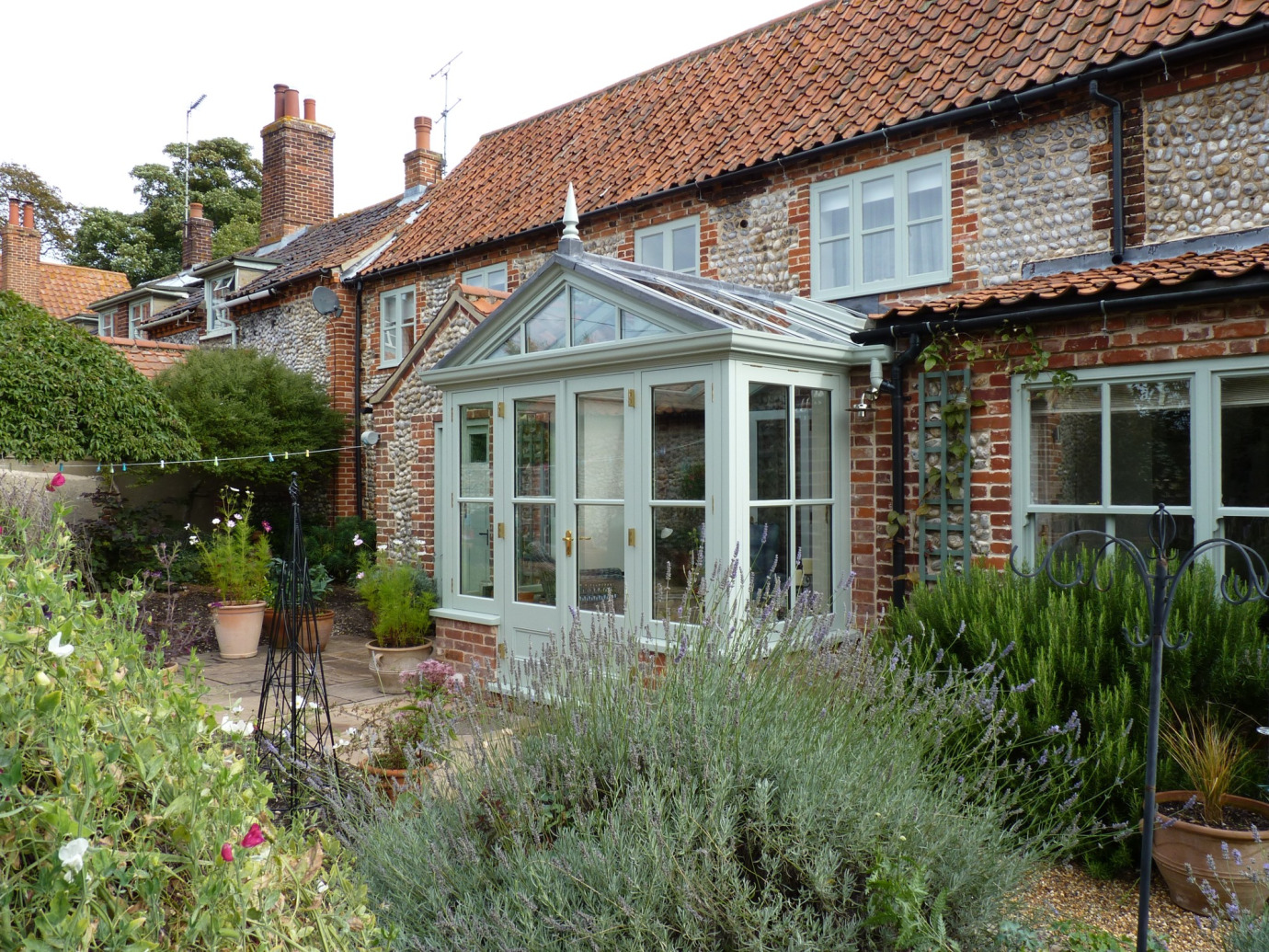 A gable conservatory for this North Norfolk flint cottage