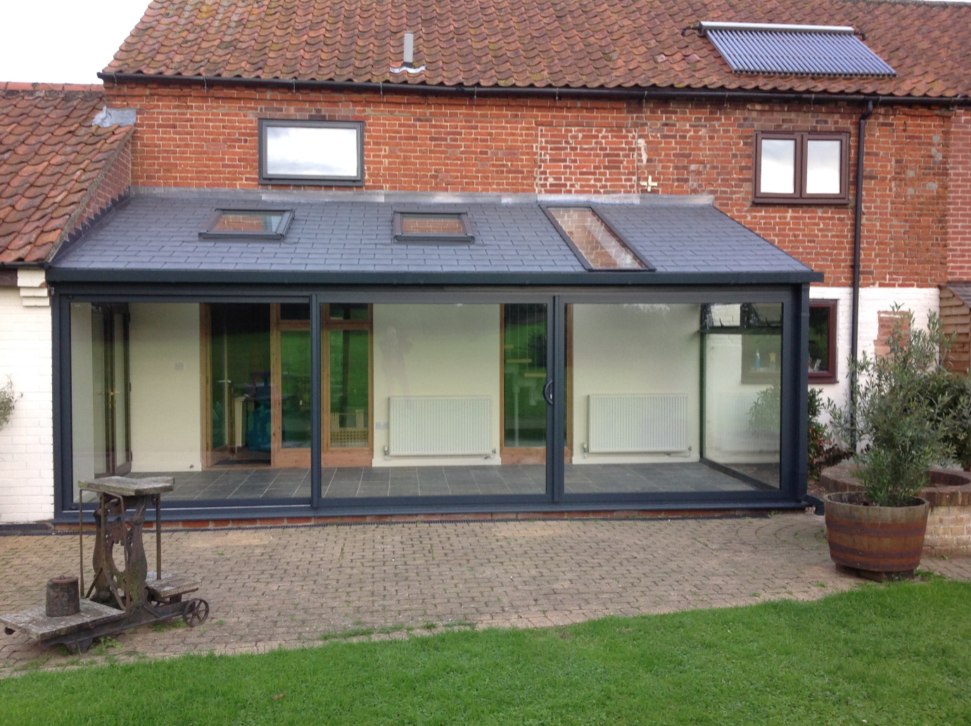 Grey aluminum slate-roofed Garden Room